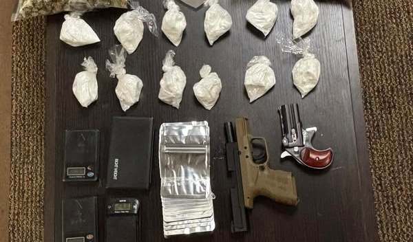 Items seized by police included marijuana, cocaine, U.S. currency and firearms. (Photo submitted)