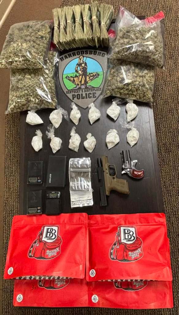 Items seized by police included marijuana, cocaine, U.S. currency and firearms. (Photo submitted)