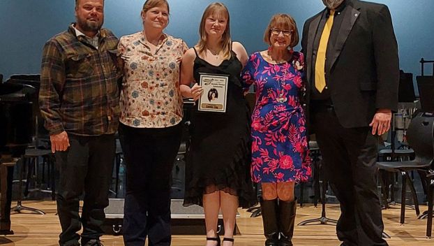 Pictured left to right are Stone Clay, father; Ella Clay, mother; Camilla Clay, recipient of the Danielle Thomas Memorial Scholarship; Jamie Thomas Bright, Danielle's mother; and Zach Shelton, Director of Boyle County Bands. (Photo submitted)
