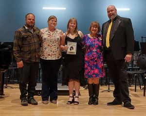 Pictured left to right are Stone Clay, father; Ella Clay, mother; Camilla Clay, recipient of the Danielle Thomas Memorial Scholarship; Jamie Thomas Bright, Danielle's mother; and Zach Shelton, Director of Boyle County Bands. (Photo submitted)