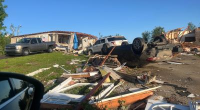 Cars are flipped over as tornado damage is seen on Bourbon Road in Somerset, Ky. on May 17, 2025. (Caleb Lowndes / Bowling Green Daily News)