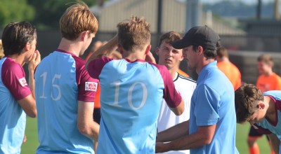 Danville Locomotive coach Tate Spivey talks with his players prior to the start of their game Sunday. (Photo by Mike Marsee)