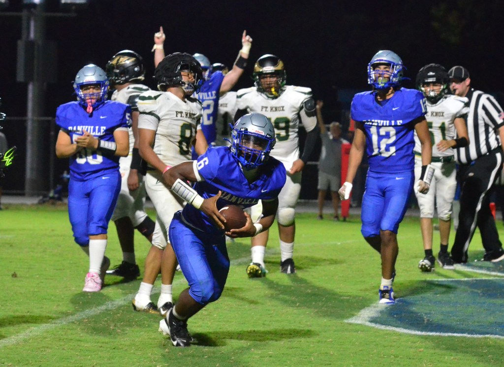 Jayvian Meaux (6) of Danville reacts after reaching the end zone on a 3-yard run during the first quarter for the first of his four rushing touchdowns Friday. (Photo by Mike Marsee)